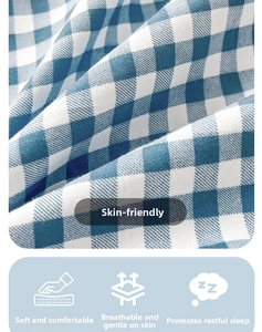 Close-up of blue and white checkered cotton fabric showing soft breathable texture