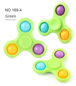 Detail view of fruit green fidget spinner with colorful silicone push bubbles model NO.169-4
