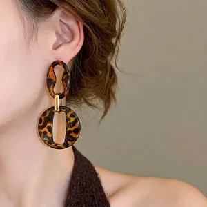 Retro acrylic leopard print drop earrings for women with gold metal accents