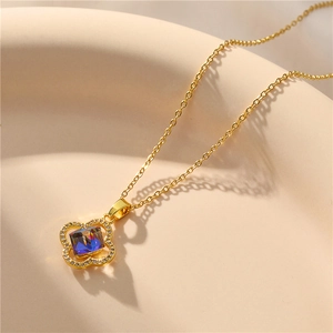 Gold plated four leaf clover necklace with gradient crystal and zircon setting