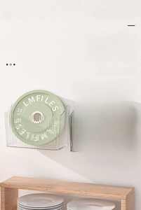 Wall-mounted transparent storage box showing 10kg load-bearing capacity with thick PET material