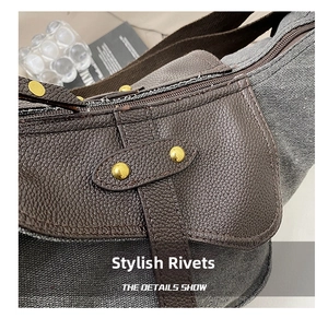 Detail showing grey canvas and brown litchi leather texture with gold rivet studs