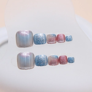 Blue and pink gradient aurora press-on toenails with glitter and stripe patterns set