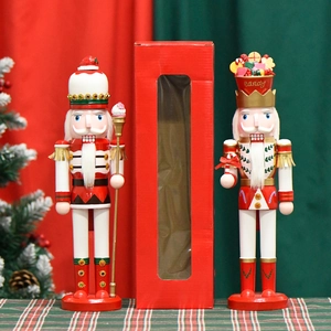 38cm candy theme nutcracker king statues in festive red and green Christmas setting