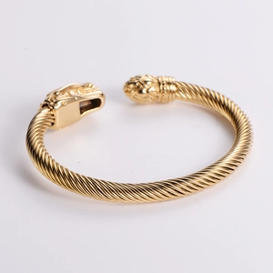 Polished 18k gold plated stainless steel cable cuff bracelet with dragon head design