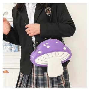 Detail of mushroom cross-body bag in purple and white PU leather with metal chain