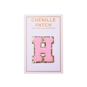 Detailed pink chenille letter H patch with gold sequins and peel and stick adhesive