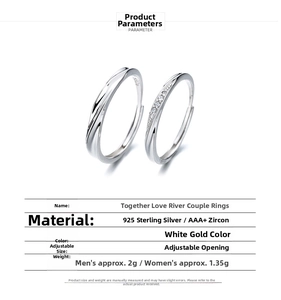 Detail of 925 sterling silver couple rings with twisted texture and zircon inlay