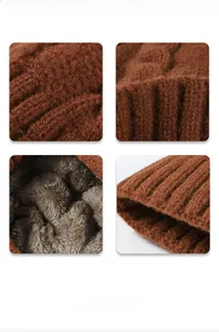 Detail of brown cable knit beanie with thick grey fleece lining for cold weather warmth