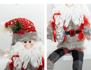 Macro detail of Nordic Santa doll showing knit textures, faux fur, and festive embroidery