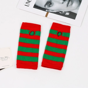Detail of red and green striped knitted arm warmers with thumb holes on white background