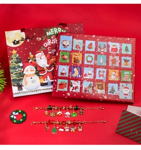 Detailed Christmas Advent calendar box with 24 DIY charm bracelets and festive pendants