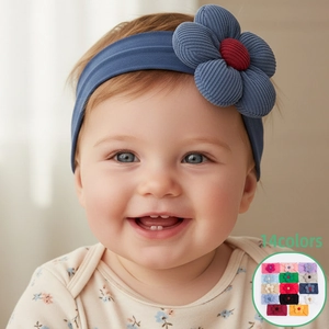 Close-up of blue knitted flower headband on baby with high-stretch nylon band