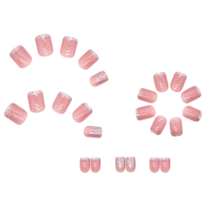 24-piece set of nude pink press-on nails with shiny silver glitter French tips for women