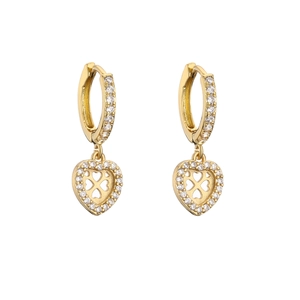 Macro detail of gold hoop earrings featuring micro-paved zircon heart-shaped pendants