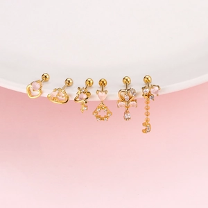 Pink gemstone and gold stainless steel screw back earrings in various fairy designs