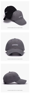 Detail of adjustable metal buckle and breathable eyelets on cotton baseball cap