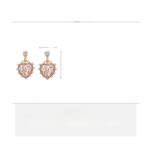 Detail view of heart-shaped leopard print earrings with rhinestone inlay dimensions