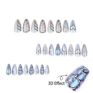 Y2K ice blue gradient press-on nails with 3D silver cyberpunk textures and 24 pieces