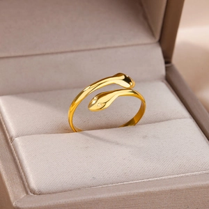 Detailed close-up of 18k gold plated snake ring featuring twin heads and zircon inlay