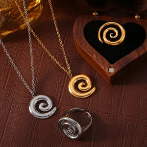 Elegant gold and silver titanium steel spiral pendant necklace and matching ring set
