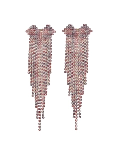 Close-up of luxury long tassel earrings with rose pink and purple gradient rhinestones