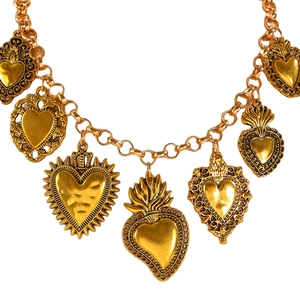 Detailed close-up of a vintage golden multi-pendant necklace featuring seven sacred hearts