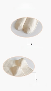 Detail of boneless toe seam and reinforced 3D heel on cream cotton striped socks