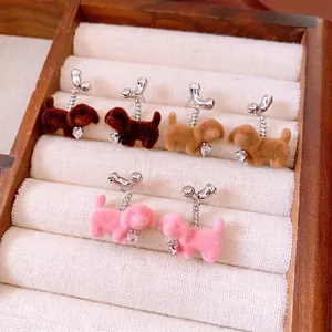 Flocked puppy drop earrings with heart zircon, featuring silver needles in three cute colors