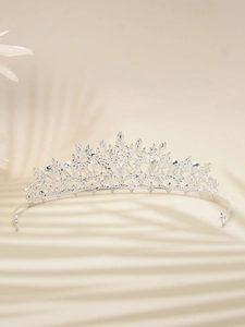 Close-up of vintage bridal crown with sparkling rhinestones and silver alloy details
