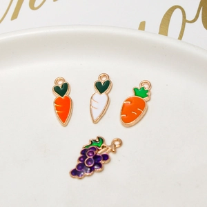 Detail view of alloy enamel carrot and grape pendants for DIY jewelry making