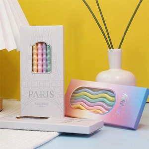 Colorful macaron curved pencil cake candles in Paris themed box for birthday parties