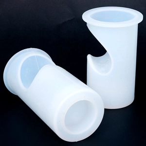 Macro detail of U-shaped slot on cylindrical silicone molds for DIY candle making