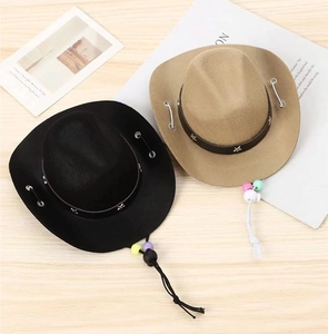 Detail view of felt cowboy hats for dogs in black and khaki with beaded chin straps