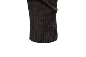 Close-up of high-quality ribbed cuffs on a men's knitted cardigan sweater in dark brown