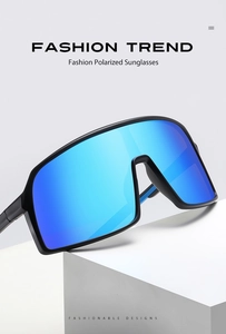 Detail of blue mirrored polarized sunglasses with matte black frame and oversized design