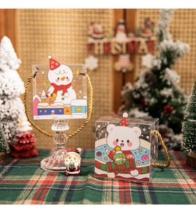 Christmas transparent gift box with snowman and bear designs and golden woven handles