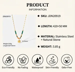 Detail of 18K gold stainless steel necklace with sunburst pendant and natural stone beads