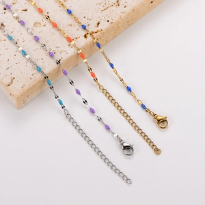 Bohemian enamel bead link bracelet in gold and silver finish with colorful accents