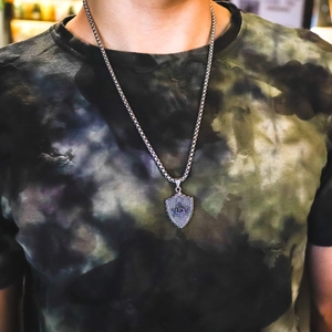 Men's titanium steel Freemason shield pendant necklace accessory shown on model