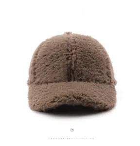 Close-up of the thick brown plush faux fur texture on a classic baseball cap crown