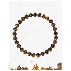Macro shot of tiger eye beaded bracelet featuring natural stones on a white gift card