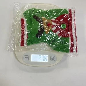 Weight measurement of 27.6g for the Christmas knitted bottle cover with deer antler decor
