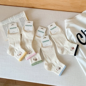 Detail of five-pair women's low-cut socks set with cute animal embroidery and speckled yarn
