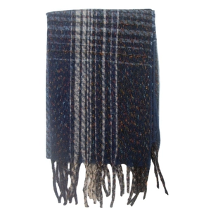 Detail of blue and grey striped scarf featuring colorful specks and fringe tassels