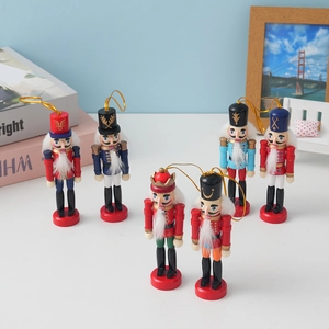 Set of 6 classic wooden Nutcracker soldier ornaments with colorful painted details and gold cords
