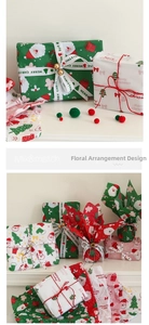 Detailed view of Christmas bouquet wrapping paper sets with festive ribbons and patterns