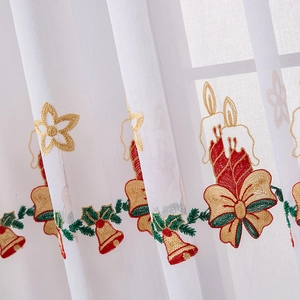 White Christmas sheer curtain with festive red and green embroidery of bells and stars