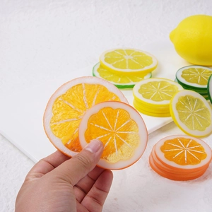 Realistic PVC lemon and orange slices with translucent texture and clear fruit grain