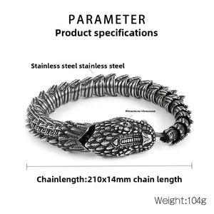 Detailed macro view of the punk style dragon bracelet featuring green rhinestone eyes